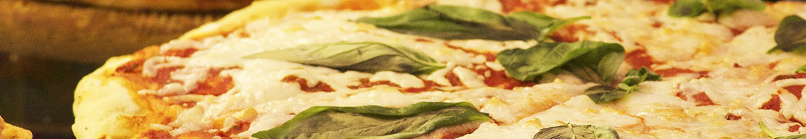 Eating Italian Pizza at Pizzeta Enoteca restaurant in Livingston, NJ.